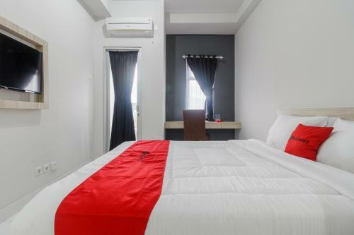 Hostal Reddoorz Apartment @ Dramaga Tower