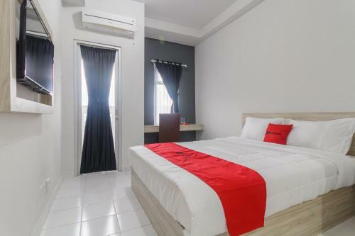 Hostal Reddoorz Apartment @ Dramaga Tower