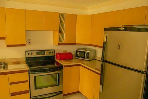 Hostal Holidays At Mango Walk Country Club