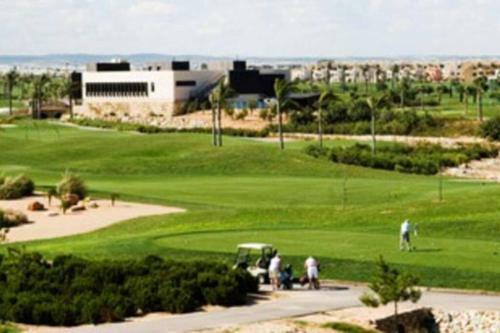 Roda Golf & Beach Resort. Townhouse, Poolside