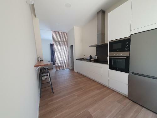 Redondela Apartments - Bedroom, Bathroom & Kitchen