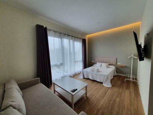 Redondela Apartments - Bedroom, Bathroom & Kitchen