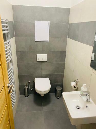 Woody Apartm�n ?ern� D?l