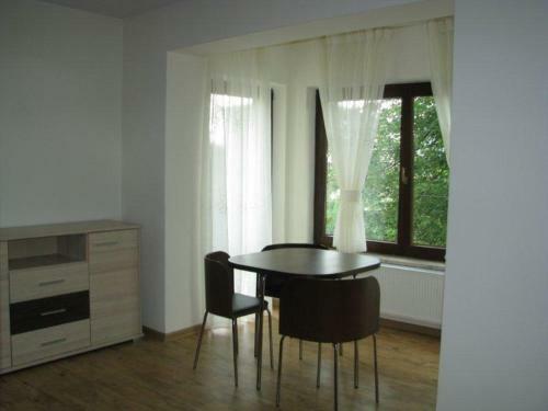 Apartamenty Pod R�?ami