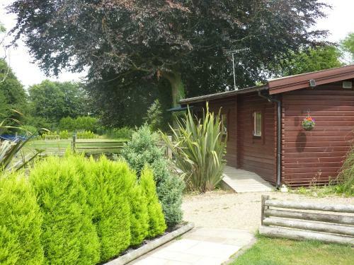 Hostal Cypress Log Cabins B&B