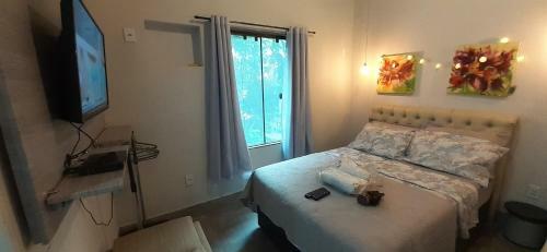 Casa Praiana Em Condominio Com Lazer