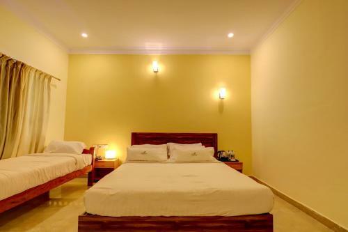 Hotel Ezzenza Royal Garden Brindavan Resort