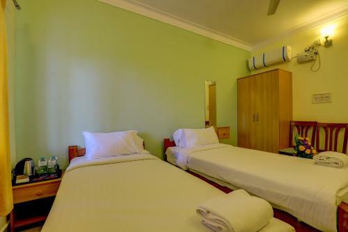 Hotel Ezzenza Royal Garden Brindavan Resort