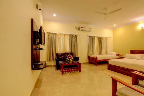 Hotel Ezzenza Royal Garden Brindavan Resort
