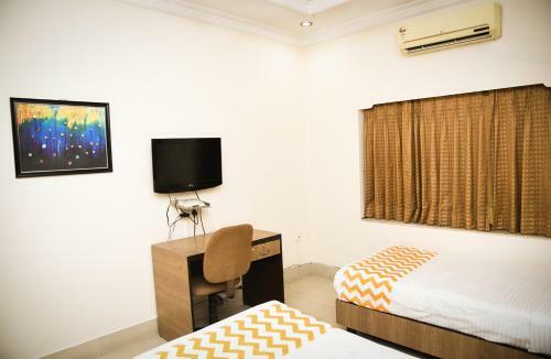 Hostal Crossroads Apartment Hotel