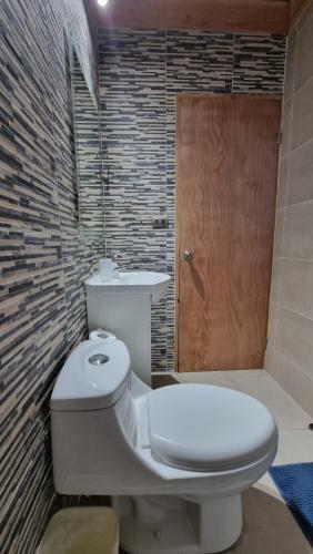 Hostal Blue House Departamento - Caba�a - Casa