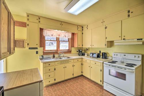 Quaint Creekside Home With Spacious Deck And Yard