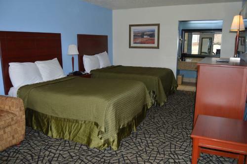 Motel Excellent Inn & Suites