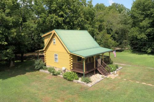 Yellow Cabin On The River Cabin