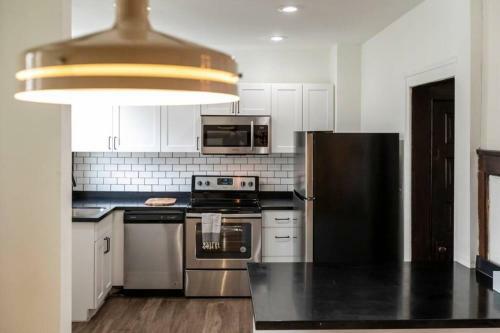 Luxe Mid-century Styled Historic Townhouse #1