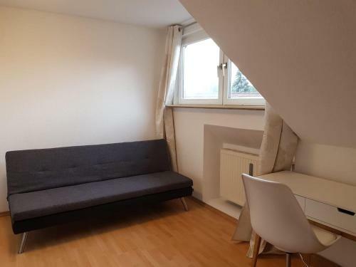 Apartamento Sonnige Dach Fereinzimmer