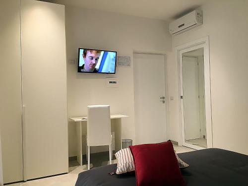 Hostal Quattro Stelle Al Porto Affittacamere