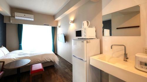 Hotel New Normal Condo In Naha Airport