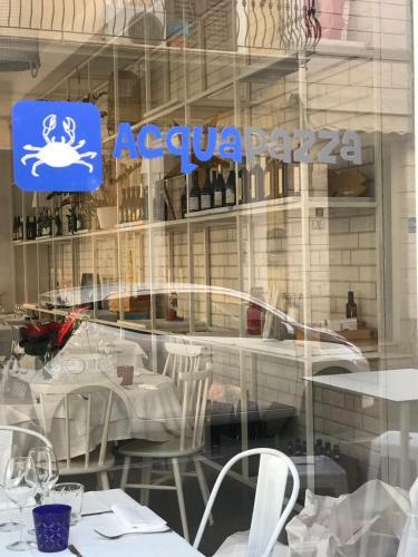 Hostal Acquapazza Restaurant & Room