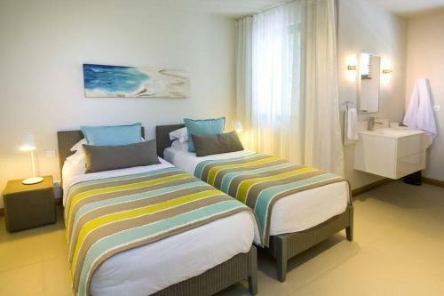 Amaranth I: Three Bedroom Beach Apartment With Rooftop Pool