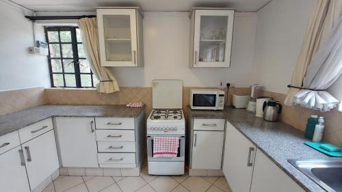 Peaceful, Spacious, Open-plan 2br Apartment Set In Large Mature Garden.