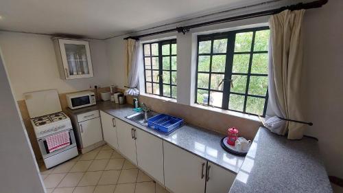 Peaceful, Spacious, Open-plan 2br Apartment Set In Large Mature Garden.