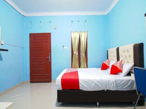 Hotel Oyo 90752 Ridho Guest House Syariah