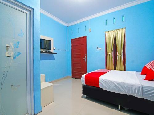 Hotel Oyo 90752 Ridho Guest House Syariah