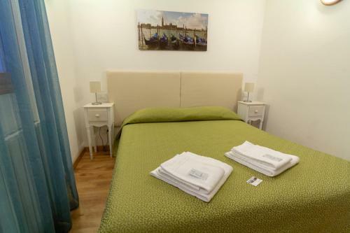 Hostal Veneziacentopercento Rooms