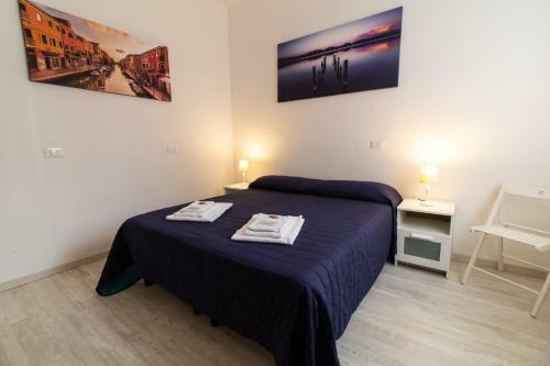 Hostal Veneziacentopercento Rooms