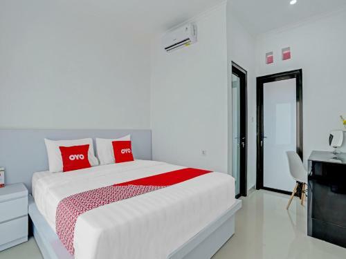 Hotel Oyo 90525 White Guesthouse