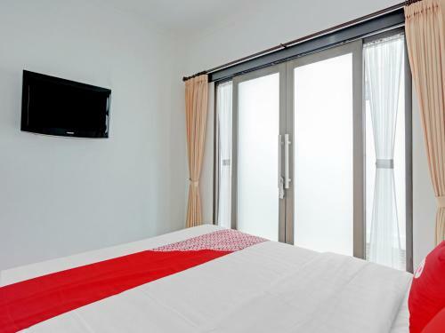 Hotel Oyo 90525 White Guesthouse
