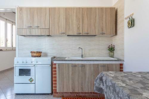 Casa Vacanza Lorena Capilungo 4/6 Posti Letto Fronte Mare
