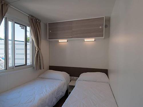 Attractive Mobile Home In Sorso With Shared Pool