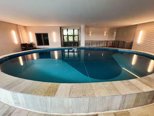 Apto Moderno A 60m Do Mar Em Bertioga Com Piscina Aquecida