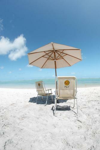 Apartamento Nui Supreme Resort - Ref�gio � Beira Mar