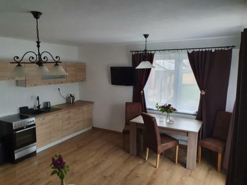 Apartm�nov� Dom Adas
