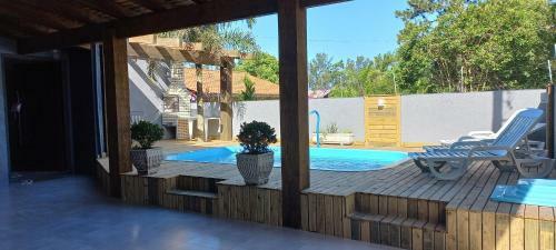 Casa Confort�vel Com Piscina Aquecida