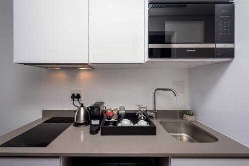 Apartamento Reserved Suites Illovo Hotel