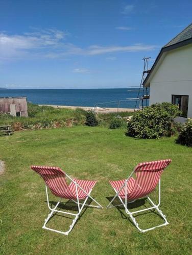 Apartamento Beach Front Coastal Retreat With Sea Views