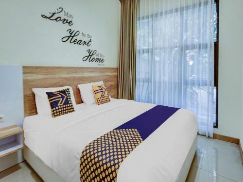 Hotel Spot On 90728 Griyapram Riverside Syariah