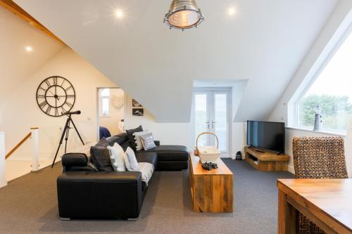 Apartamento The Lighthouse Penthouse, Studio And Holiday Home