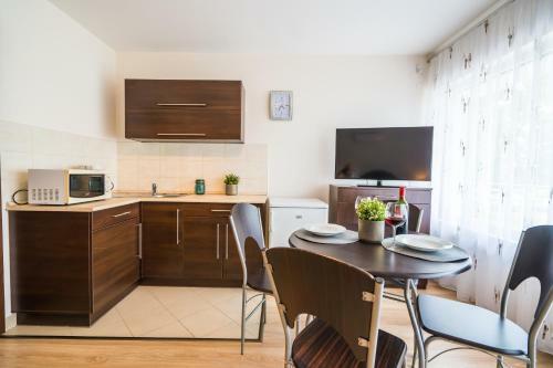 Siesta Sziget - Panor�m�s Balatonparti Apartmanok