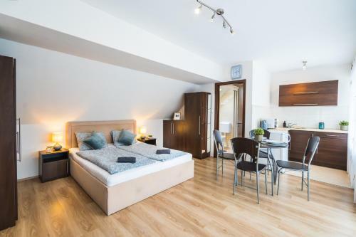 Siesta Sziget - Panor�m�s Balatonparti Apartmanok