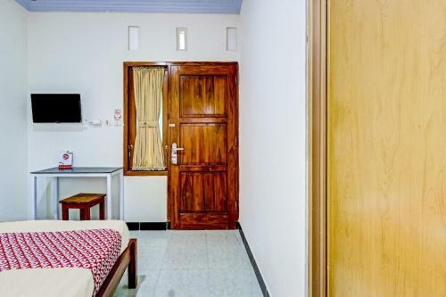 Hotel Oyo 90636 Happy Syariah