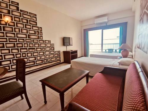 Apartamento Beachfront Deluxe Double Loft + Seaview Balcony @ D' Beach Suites
