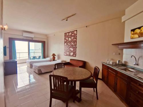 Apartamento Beachfront Deluxe Double Loft + Seaview Balcony @ D' Beach Suites