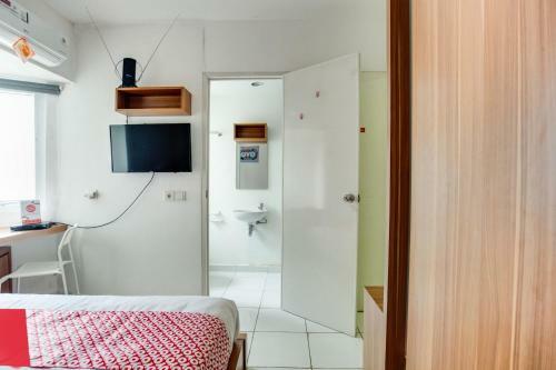 Hotel Oyo 3247 Afira Rooms Aeropolis