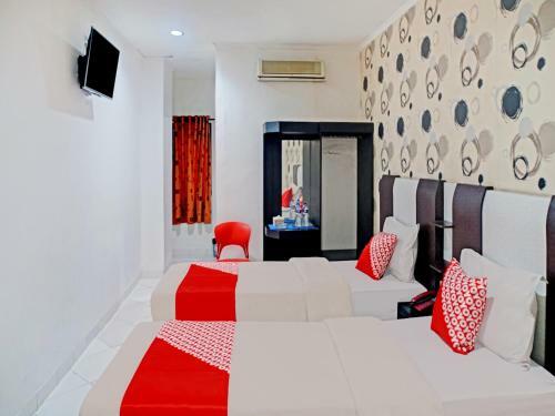 Oyo 90386 Hotel Mangga Dua Makassar
