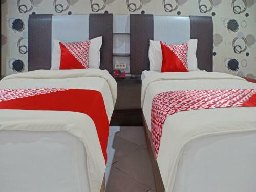 Oyo 90386 Hotel Mangga Dua Makassar
